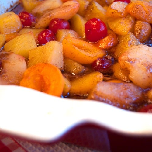 Finished baked fruit in a dish.