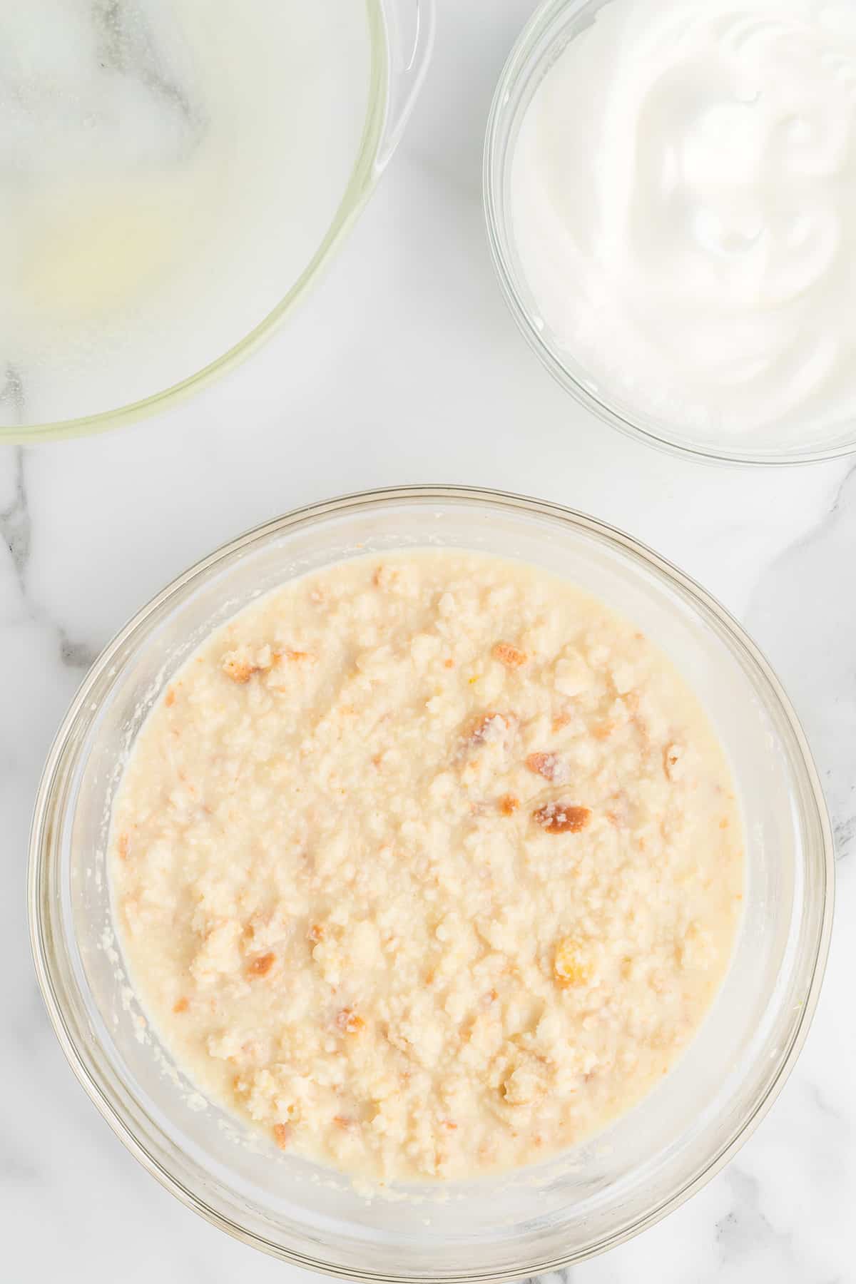 Thoroughly combined pudding mixture in a mixing bowl.