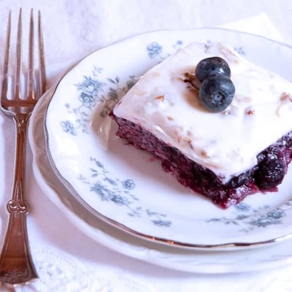 This blueberry jello salad is an old-fashioned southern recipe with blueberries and pineapple topped with a sweetened cream cheese and sour cream mixture. https://www.lanascooking.com/blueberry-jello-salad/