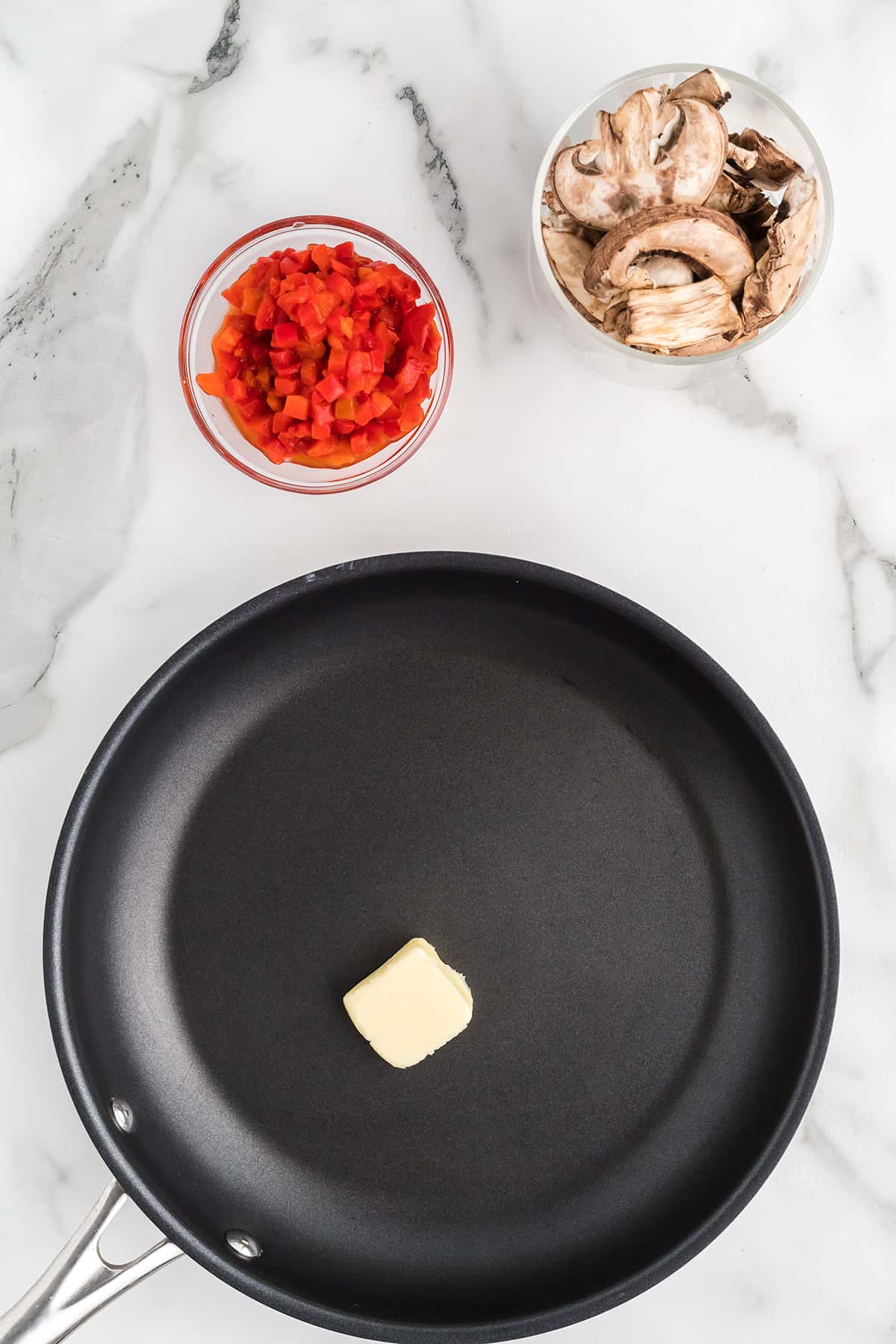 Butter melting in a skillet.