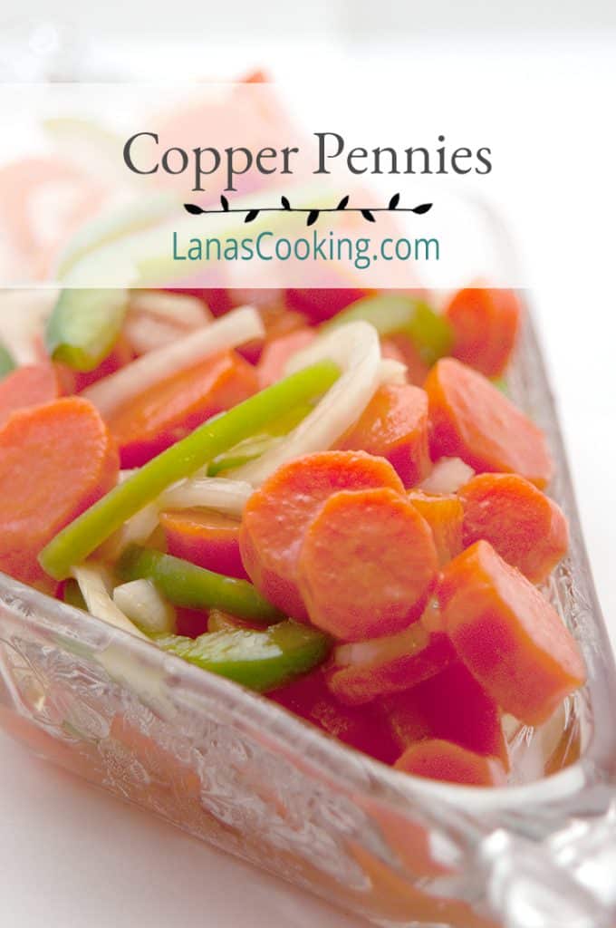 Copper Pennies salad in a decorative cut glass bowl. Text overlay for pinning.