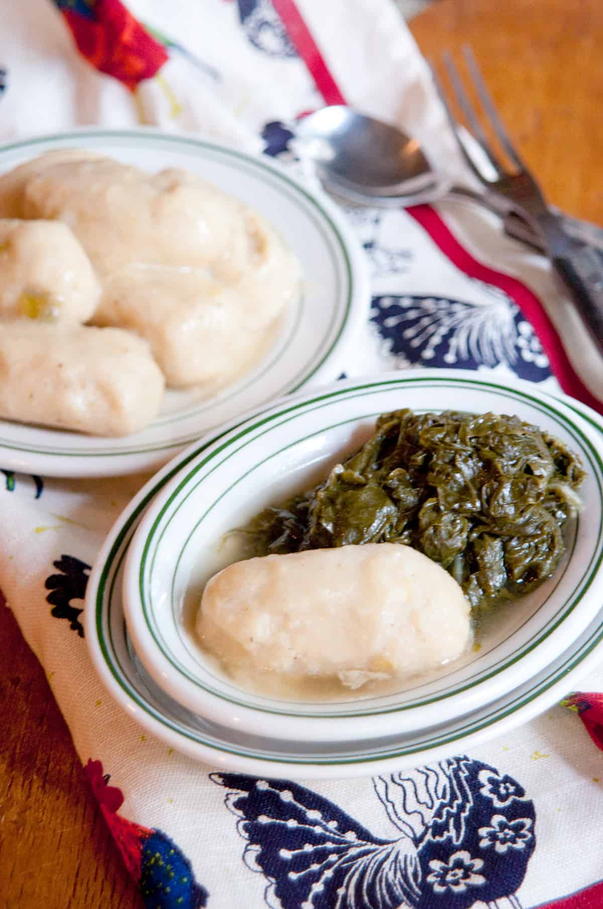 A serving of corn dodgers and turnip greens.