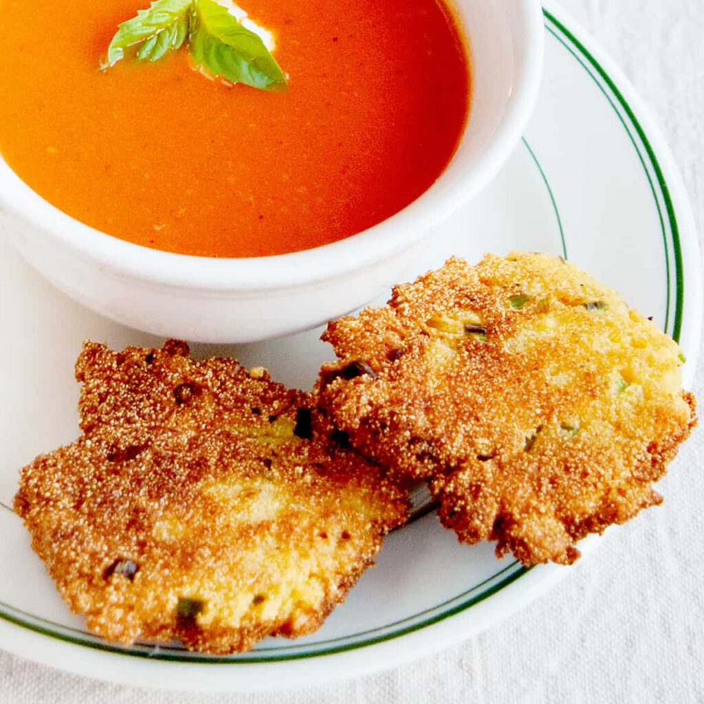 My crispy, savory Cornmeal Scallion Fritters are ready in just 15 minutes and make the perfect side dish for almost any meal! https://www.lanascooking.com/cornmeal-scallion-fritters/