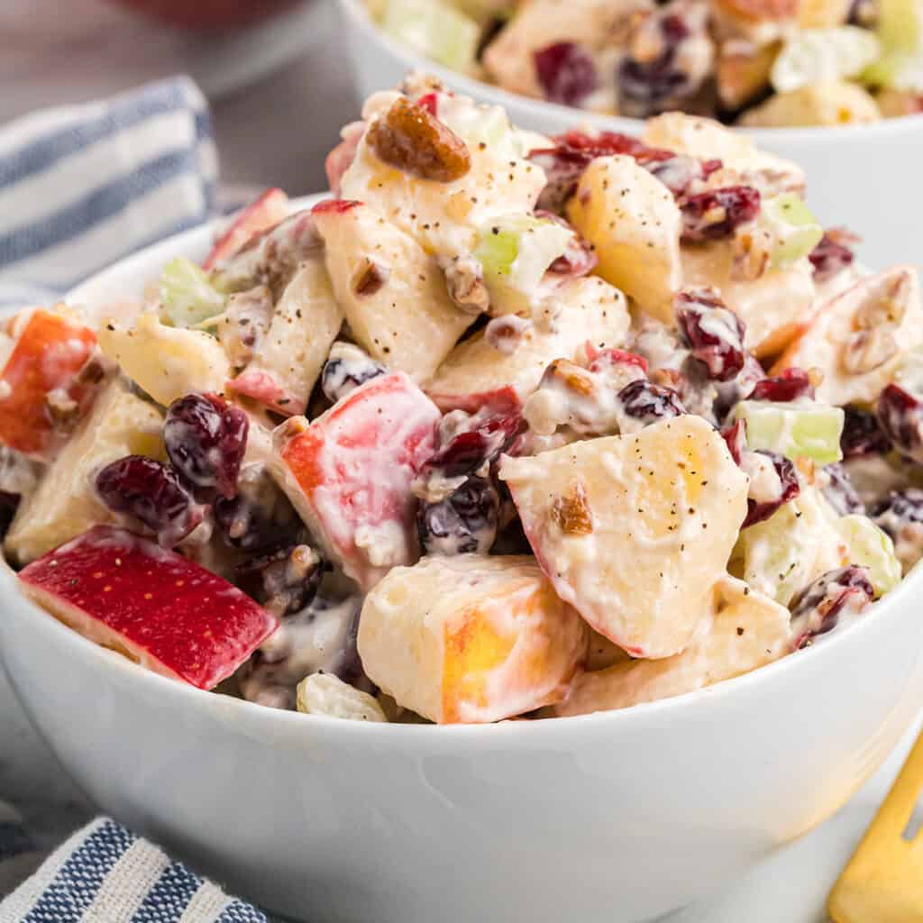 Finished salad in a white serving bowl.