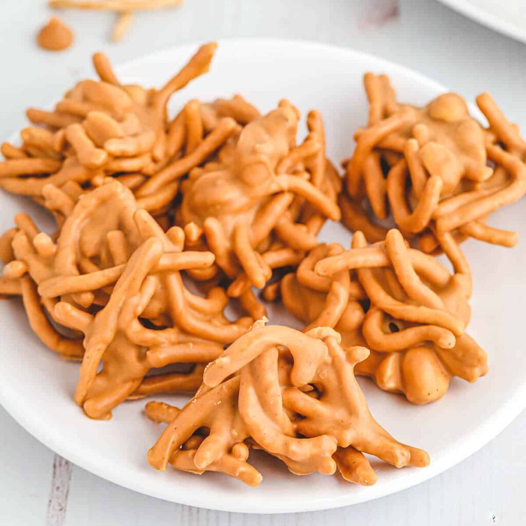 Finished haystacks candy on a white serving plate.