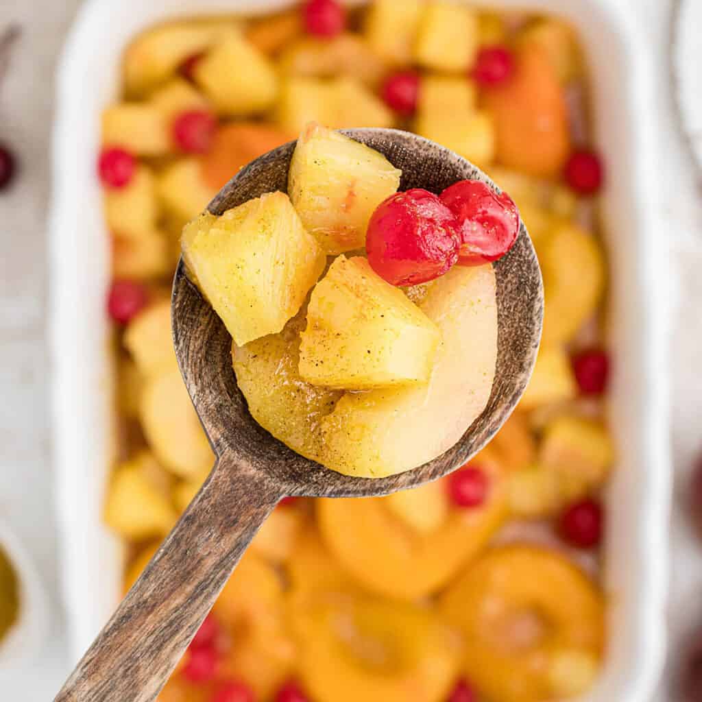 Finished baked fruit in a dish.