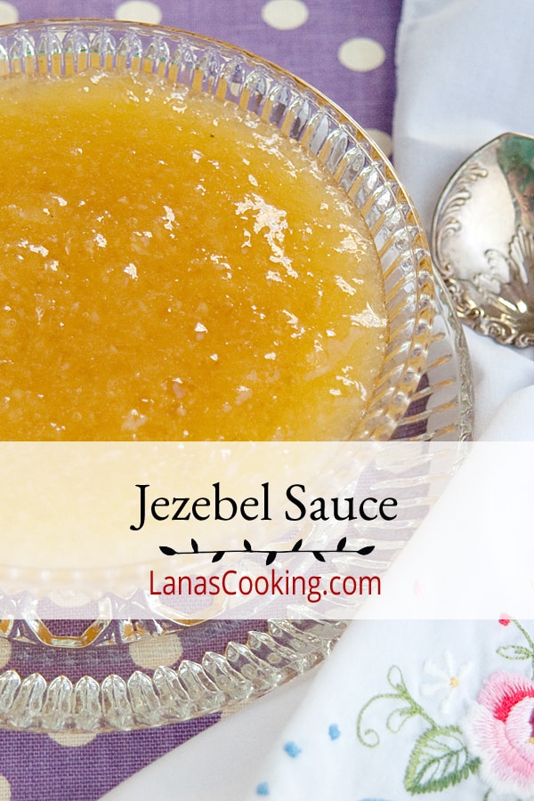 Jezebel sauce in a glass serving dish.