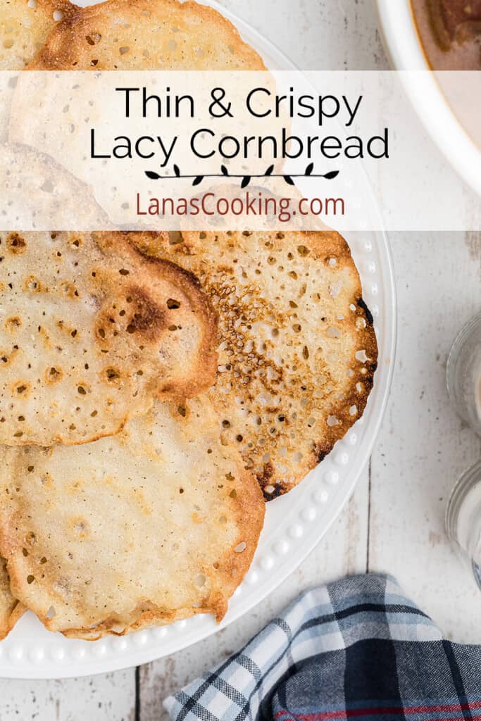 A stack of lacy cornbread on a white plate.