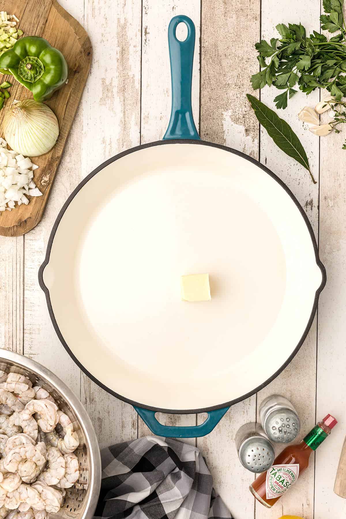 Butter melting in a skillet.