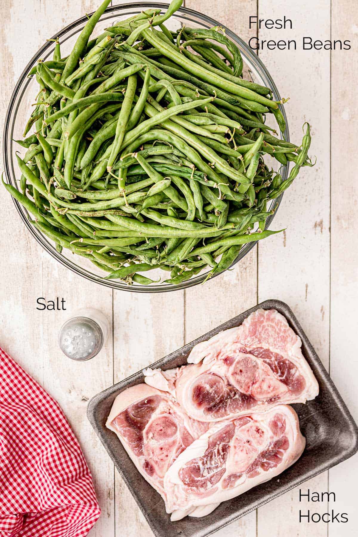 Photo of ingredients needed for the recipes: green beans, salt, ham hocks