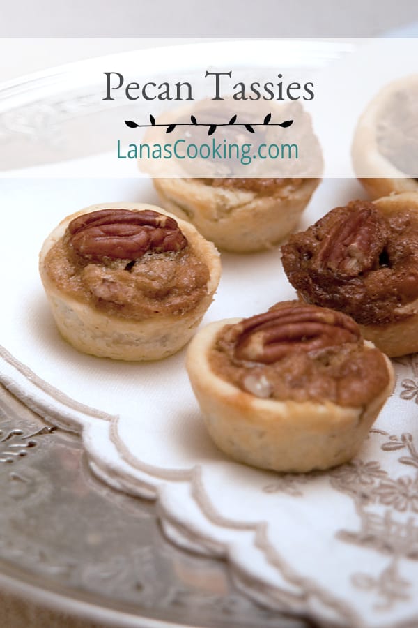 Pecan Tassies are a traditional southern holiday recipe. These two-bite mini pecan pies make a delicious addition to your dessert tray. https://www.lanascooking.com/pecan-tassies/