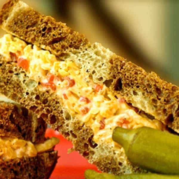 Pimiento Cheese is a true Southern classic with its sharp cheddar cheese, pimiento peppers, and mayonnaise. Use it as a sandwich filling or a spread. https://www.lanascooking.com/pimiento-cheese/