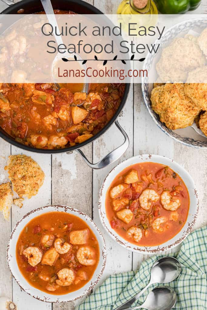 White bowls filled with Seafood Stew.