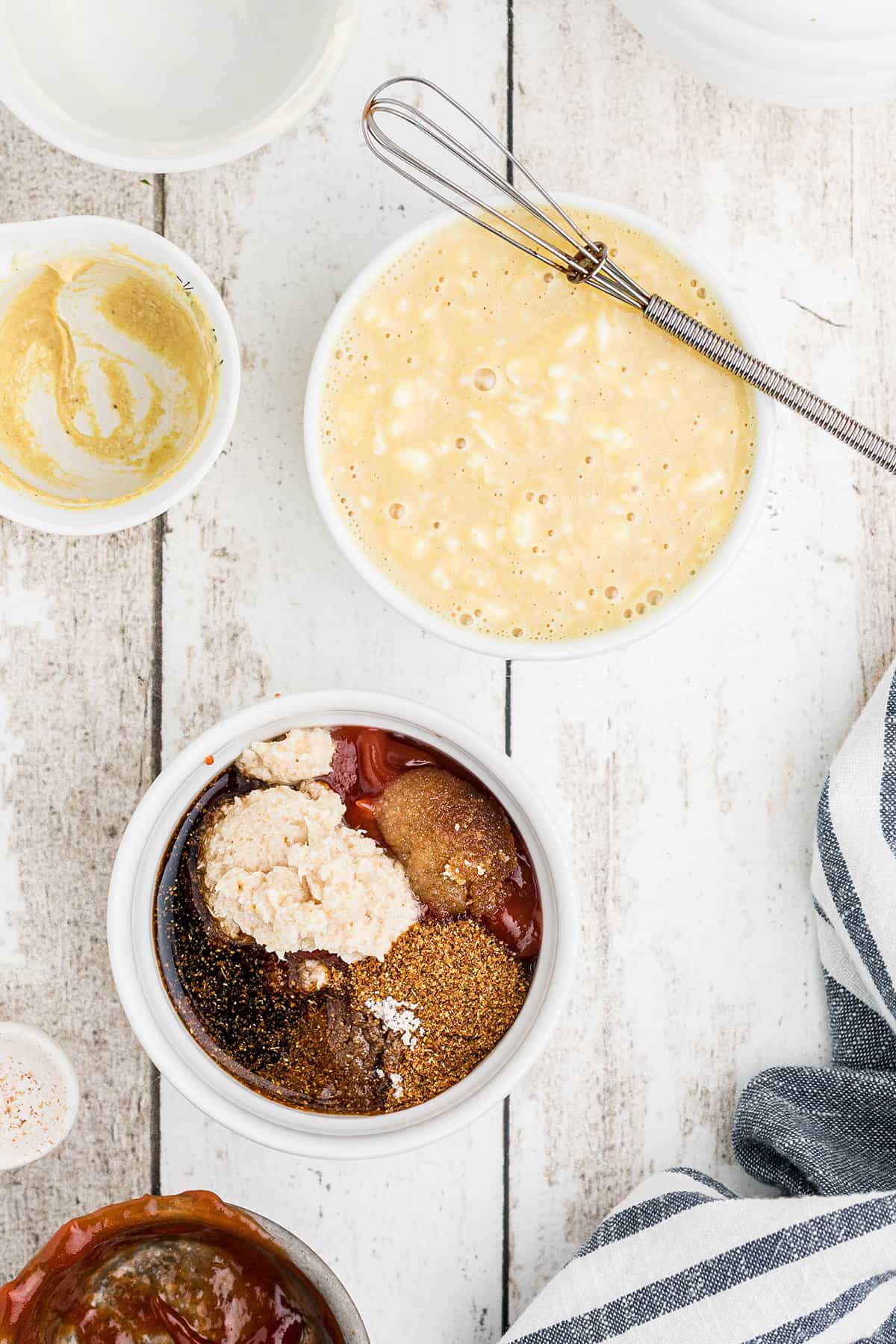 Mixing the two dipping sauces in small bowls.