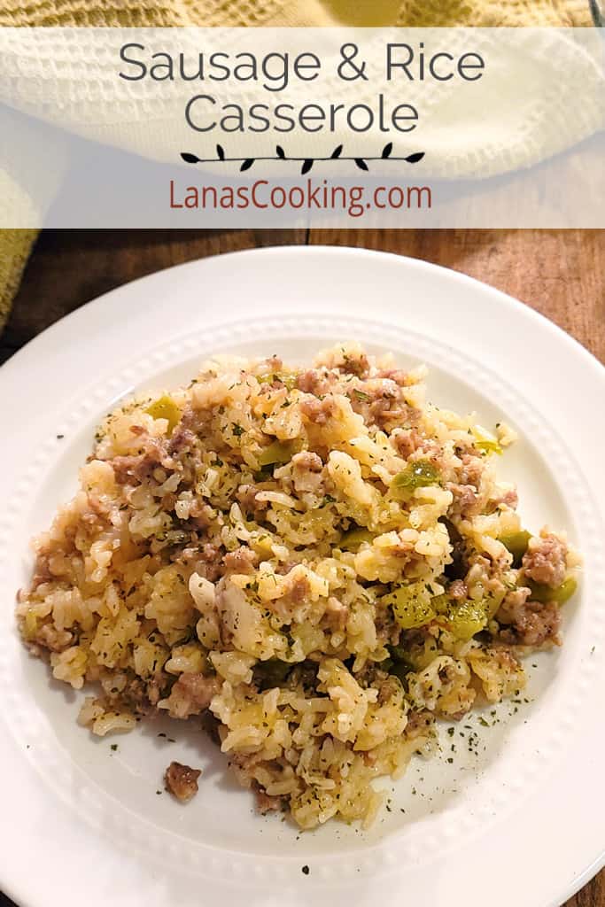 A serving of sausage rice casserole on a white plate.