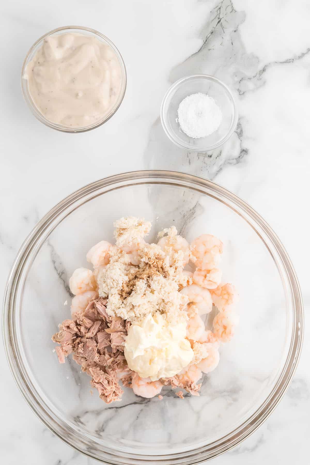 Shrimp, crab, and tuna in a bowl.