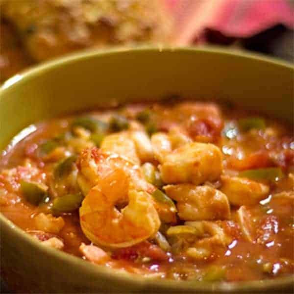 A quick and easy Seafood Stew of shrimp, cod, tomatoes and veggies. https://www.lanascooking.com/seafood-stew/