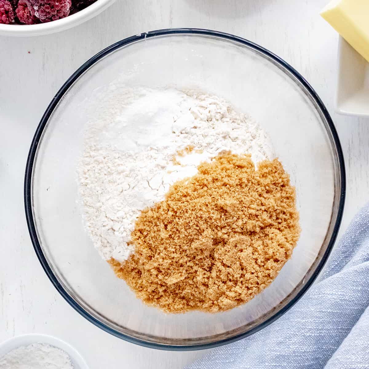 Flour, sugar, salt, and baking powder in a bowl.