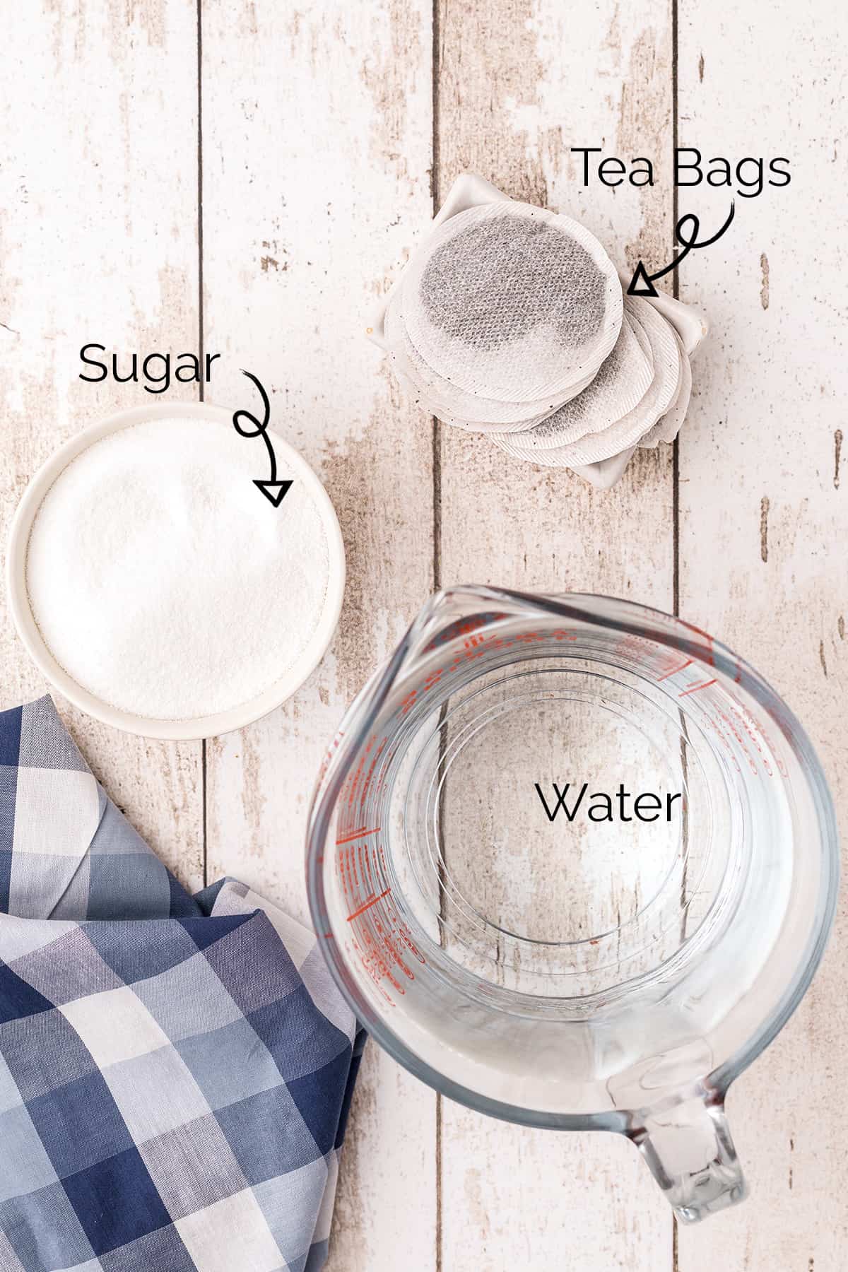 Ingredients needed to make sweet tea -- sugar, tea bags, water.