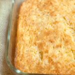 Finished Squash and Cornbread Casserole in a baking dish.