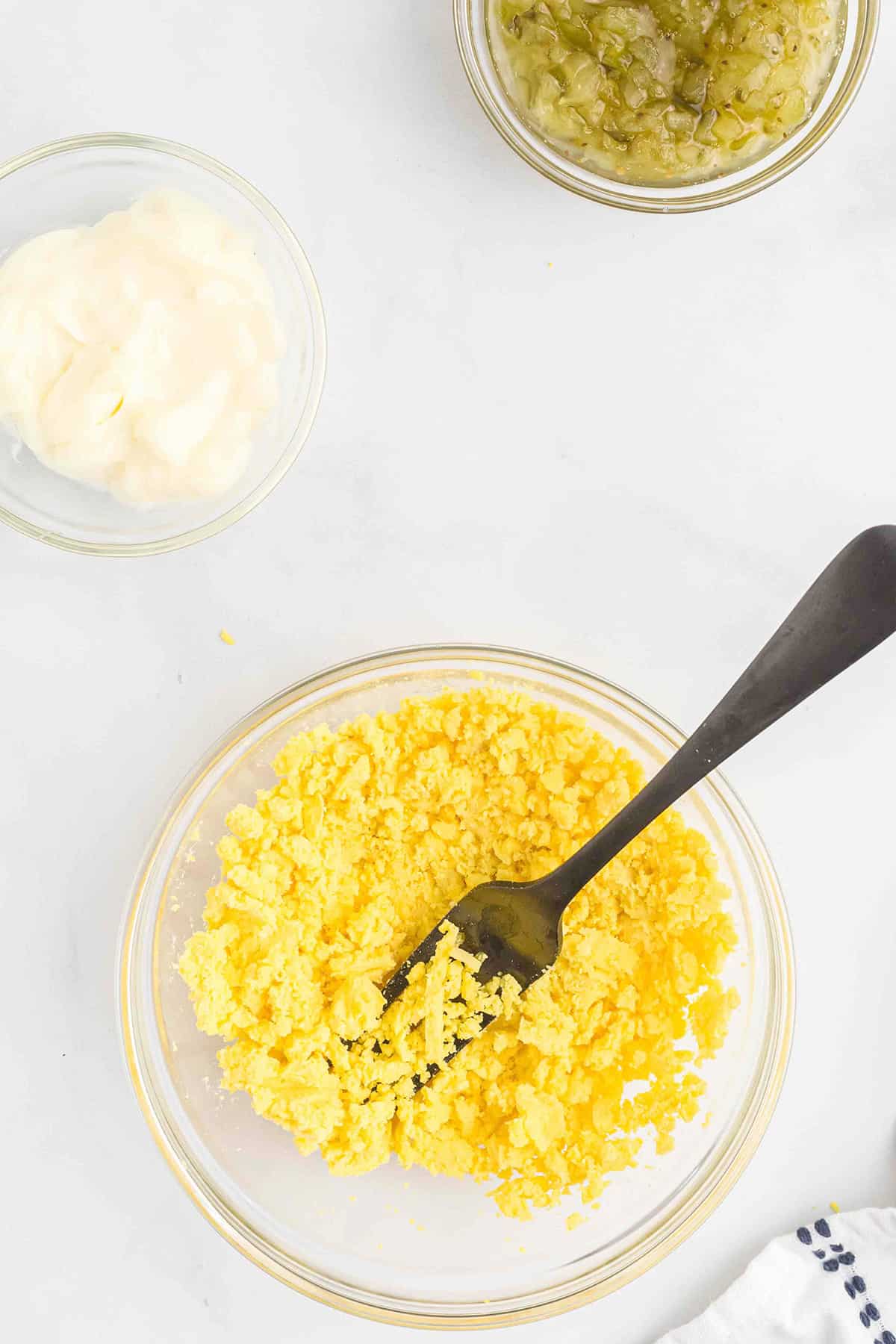 Mashed egg yolks in a small bowl.